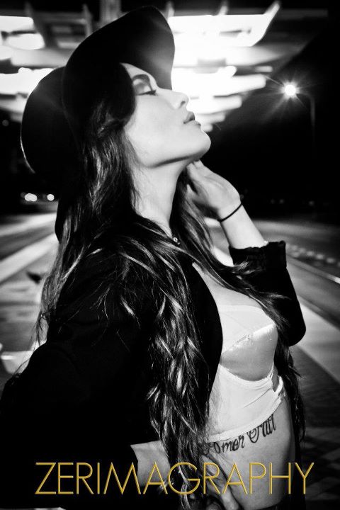 Female model photo shoot of Makeila Nierva in metro station-houston