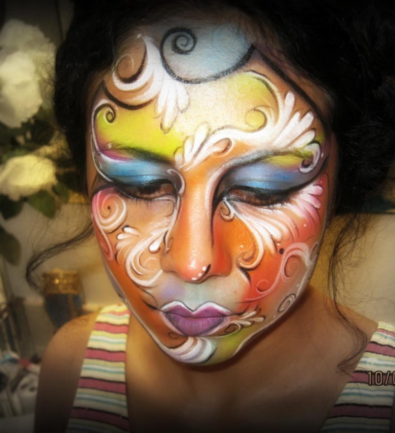 Female model photo shoot of Face Painting by Xenia
