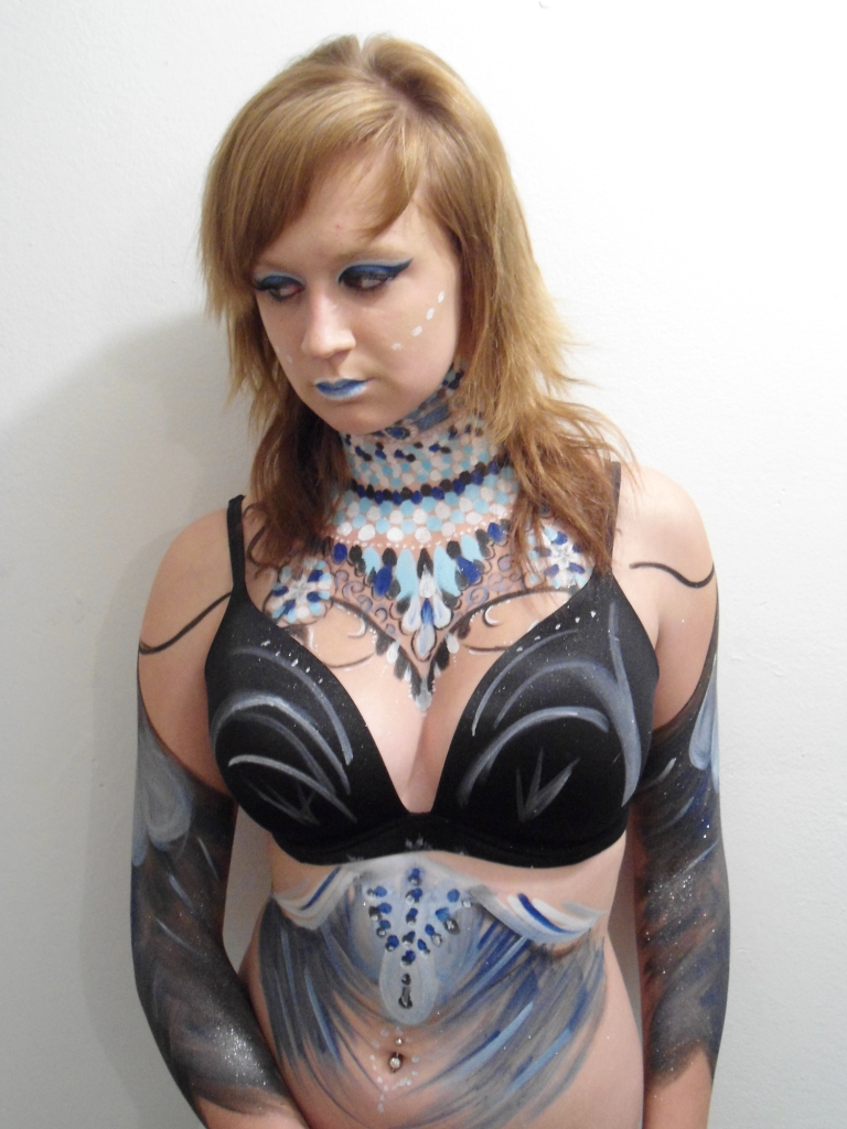 Female model photo shoot of Bellamias body painting in Southern California