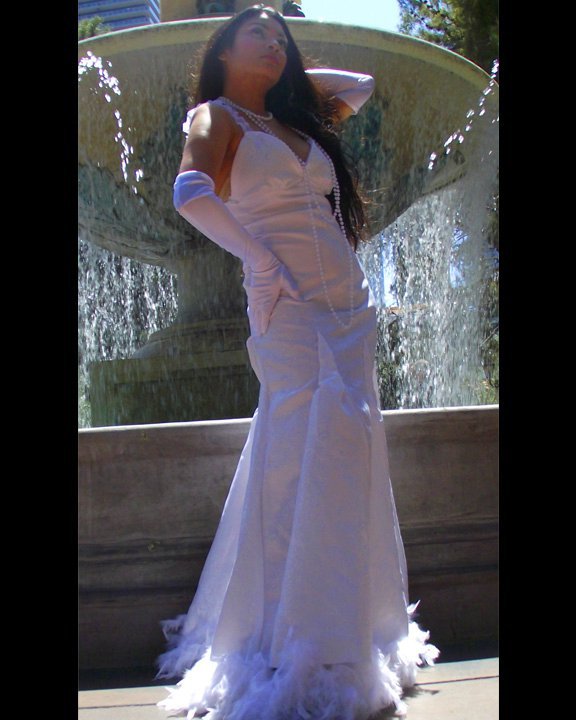 Female model photo shoot of ANGELA ELIZABETH in bellagio fountain las vegas, clothing designed by Kitt Leau