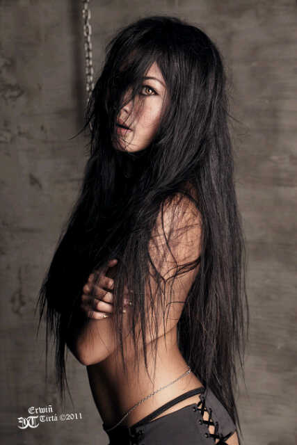 Female model photo shoot of arvi glamourous by Erwin Tirta in bandung