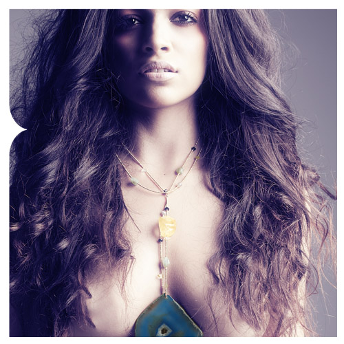 Female model photo shoot of Adha Zelma Jewelry