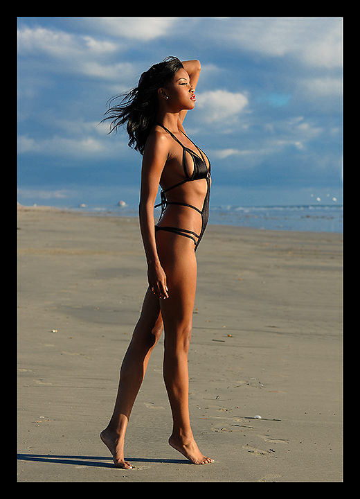 Female model photo shoot of Swimwear By Curia