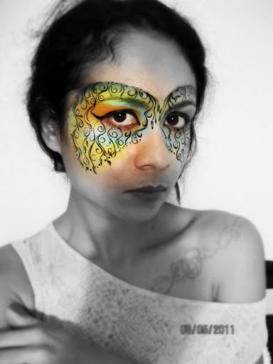 Female model photo shoot of Face Painting by Xenia in Miami
