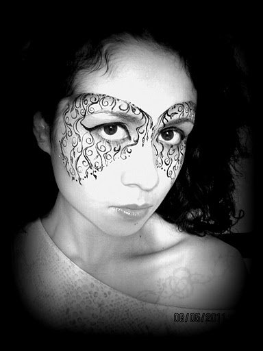 Female model photo shoot of Face Painting by Xenia in Fort Pierce