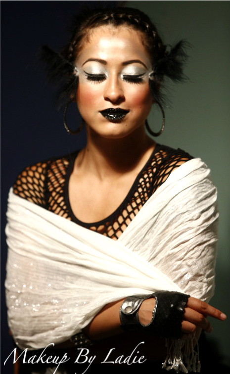 Female model photo shoot of Make-up By Ladie-One 