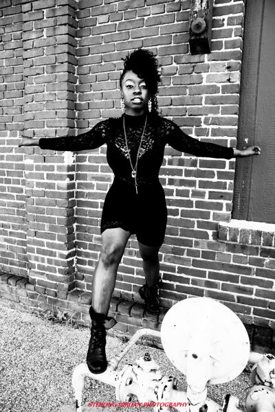 Female model photo shoot of Jalohn  in Downtown Memphis