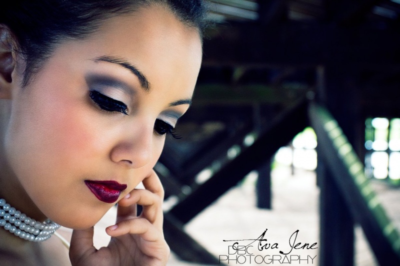 Female model photo shoot of AJ Makeup N Hairstyling