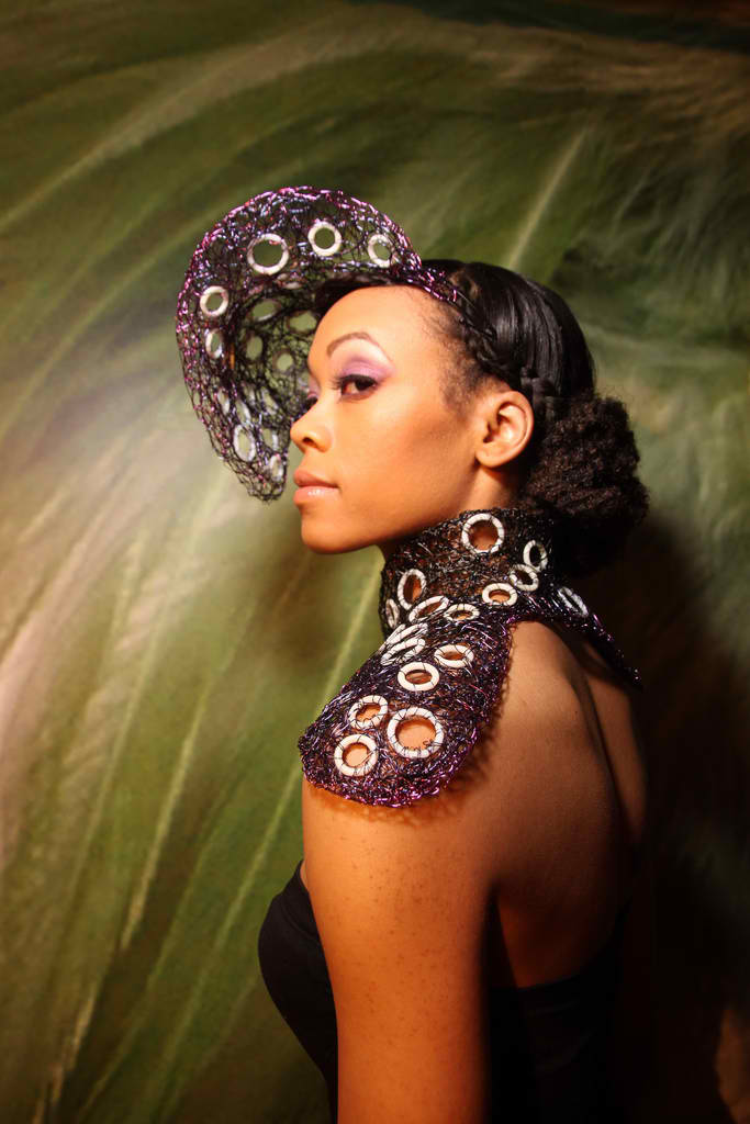 Female model photo shoot of Tyesha Simon, makeup by Linda Maldonado , clothing designed by TaviaSanza