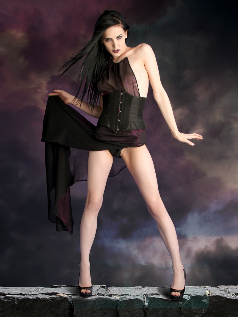 Female model photo shoot of Tara Medina and 249535 by Asylum21, clothing designed by DevoidandDeveil