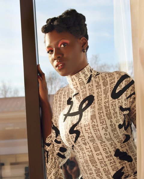 Female model photo shoot of Nyere Arinze by Leon Photo Werks, makeup by MUA Rea