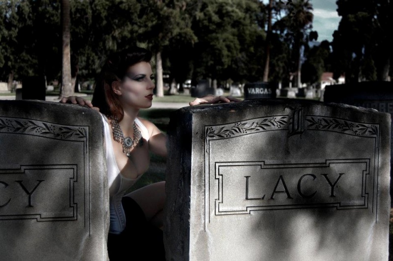 Female model photo shoot of Givemkell in San Bernardino Cemetery