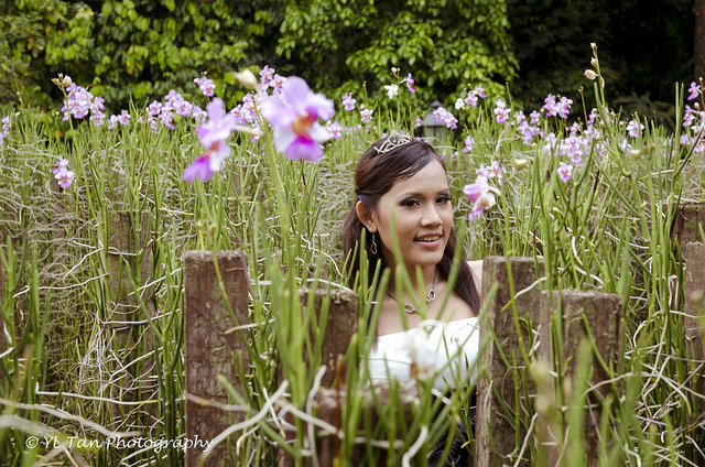 Female model photo shoot of YL Tan and Apple N in Singapore Botanic Gardens