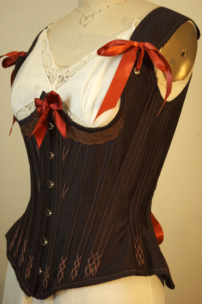 Female model photo shoot of Totally Waisted Corset in Totally Waisted! Studio