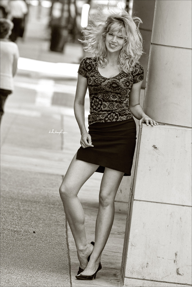 Female model photo shoot of Alissa W by T H Taylor in Downtown Milwaukee