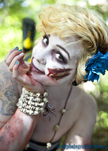 Female model photo shoot of Kelli Photography in Had a little fun doing a Zombie with a little Pinup style ;)