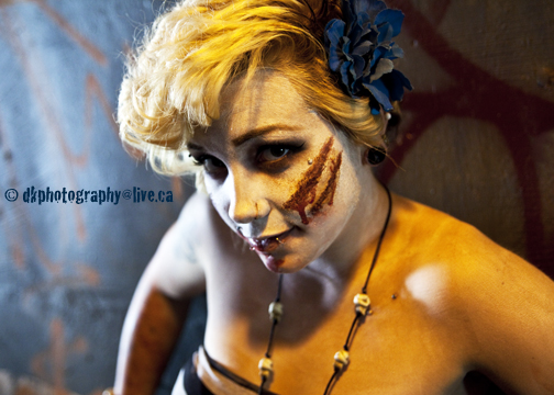 Female model photo shoot of Kelli Photography in Had a little fun doing a Zombie with a little Pinup style ;)