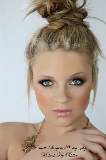 Female model photo shoot of Makeup By Rhilee