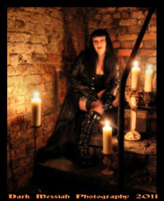 Male model photo shoot of Dark Messiah in crypt by candleight