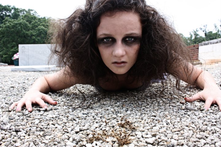 Female model photo shoot of Georgia Rose  in Grave Yard
