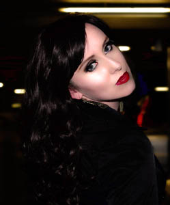 Female model photo shoot of Big Red Lipstick