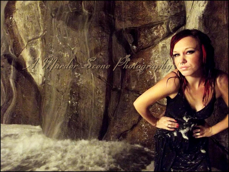 Female model photo shoot of A Murder Scene  in Lake Havasu City, AZ waterfall