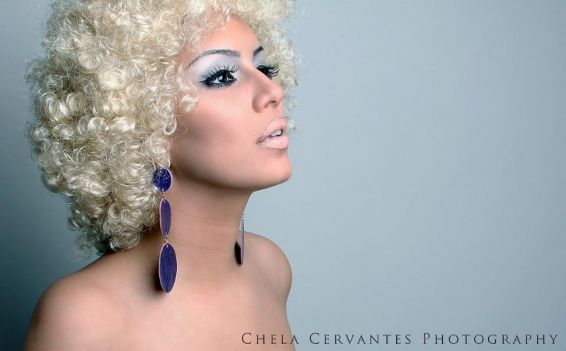 Female model photo shoot of Bombshell Makeup  by Chela Cervantes