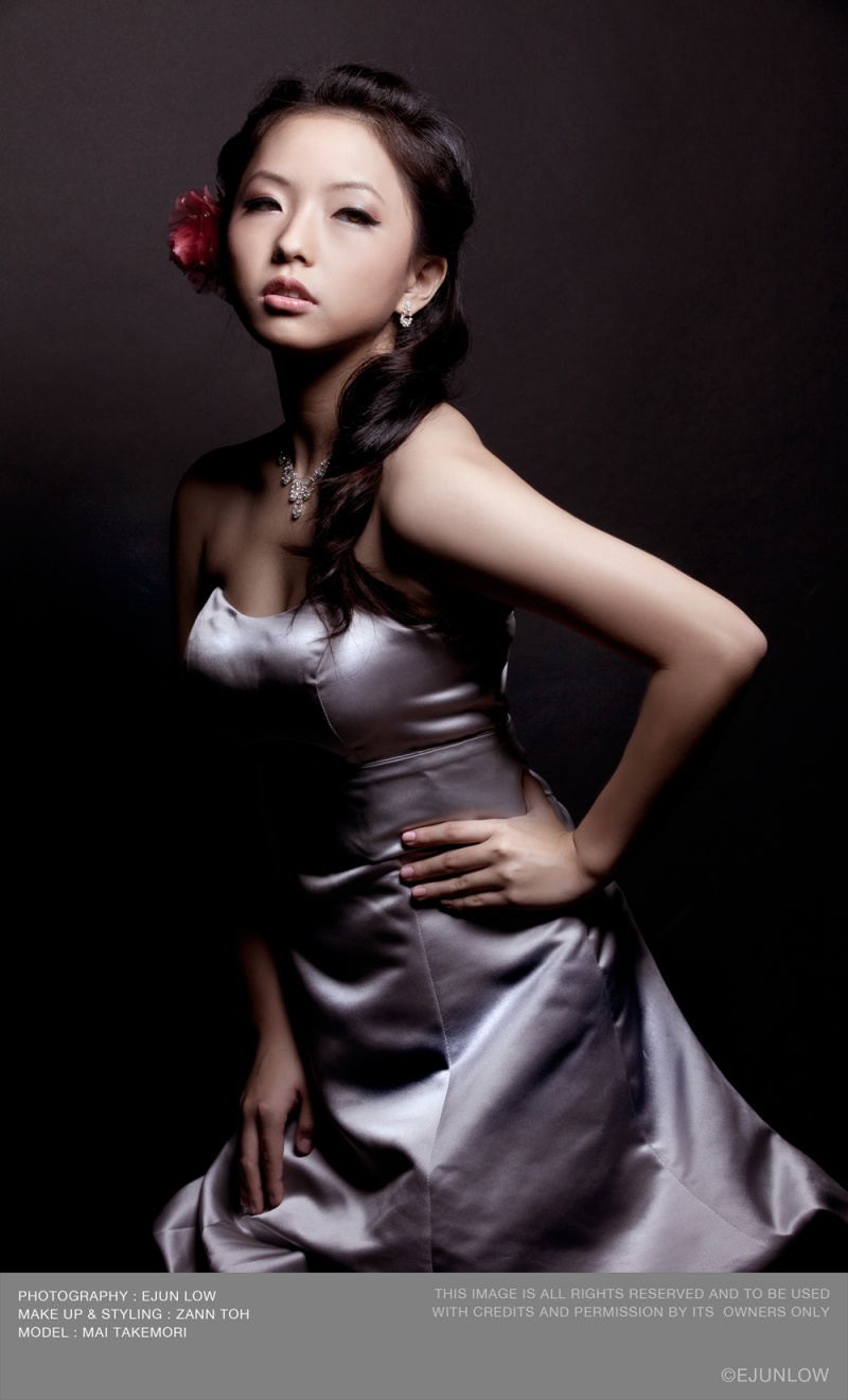 Female model photo shoot of Mai TM by Ejun Low, makeup by Zann Toh