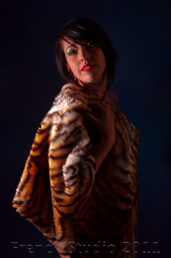 Female model photo shoot of Vixxy Venom by French Studio, makeup by Atomic Rose  MUA