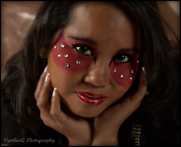 Female model photo shoot of Facepaynt Makeup