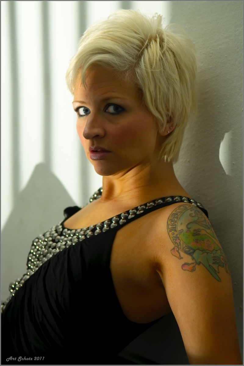 Female model photo shoot of TattoodBennett