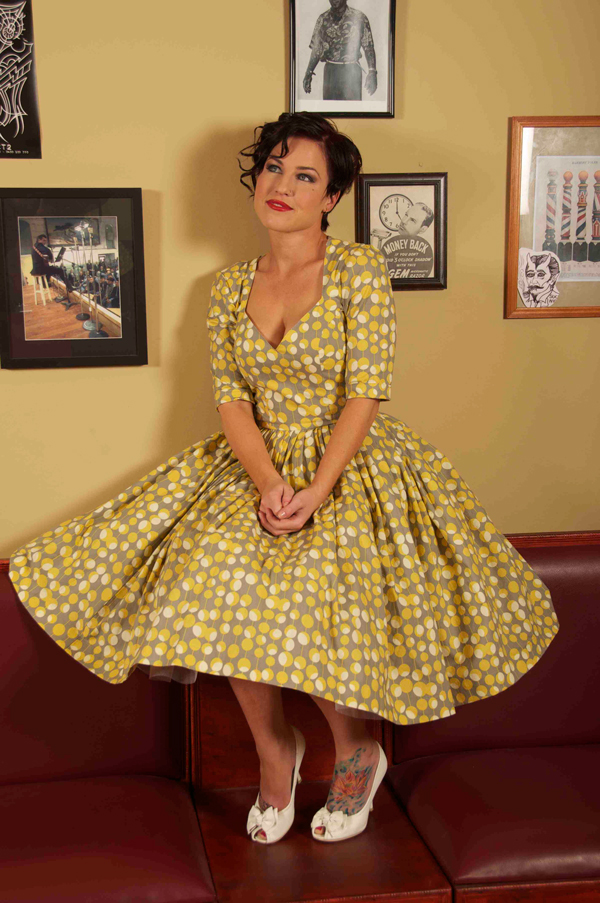 Female model photo shoot of Fifties Frocks and Rhannon Howbrigg