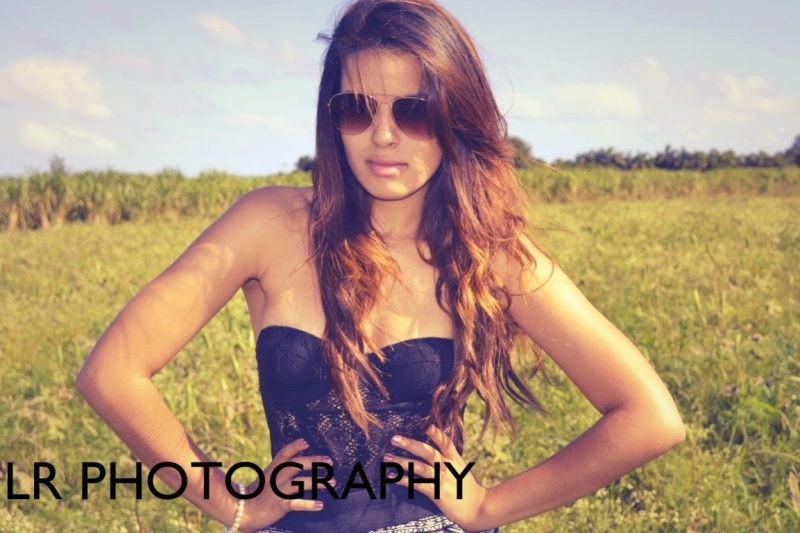 Female model photo shoot of LR Photography  in Open Field