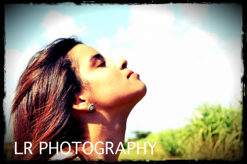 Female model photo shoot of LR Photography  in Open Field