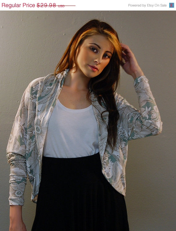Female model photo shoot of justine martinez  in http://www.etsy.com/listing/86277087/holiday-sale-the-cocoon-shurg-in-floral