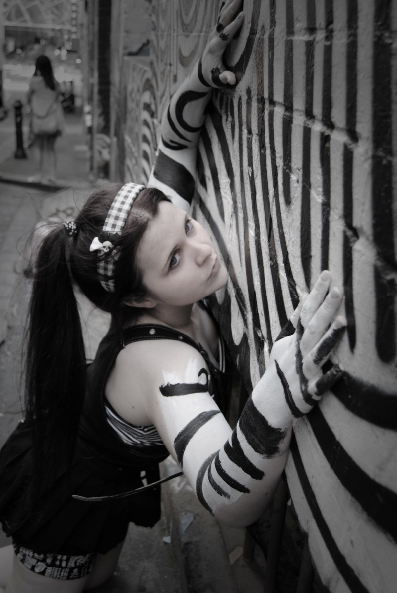 Female model photo shoot of Jenni Rokkianen and annie pants in Graffiti Alley