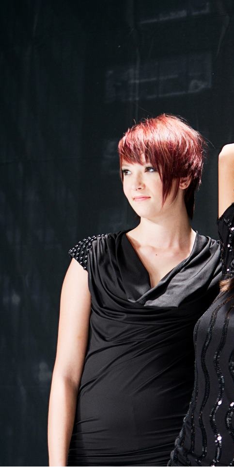 Female model photo shoot of Brittany West in Redken Centricity Orlando 2011