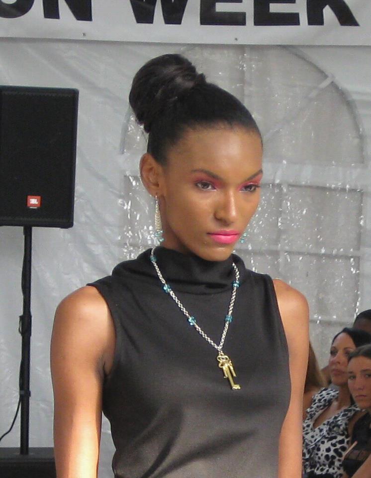 Female model photo shoot of Dominique Hannon in NJ fashion week on the runway