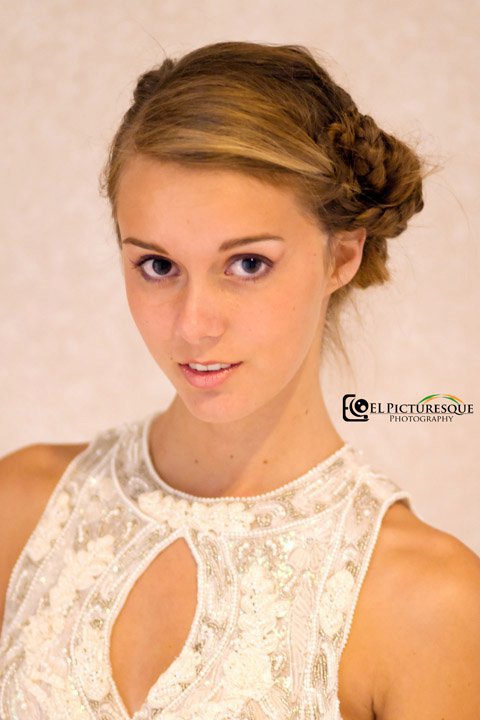 Female model photo shoot of Designer Barcia - MUA