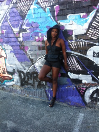 Female model photo shoot of Legra Michelle in Downtown's Historic Art District