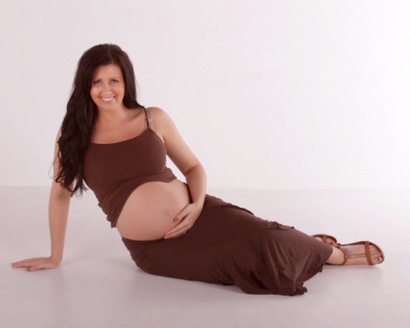 Male and Female model photo shoot of ModelMaternity and Reagan Michelle in Houston Skyline Studio