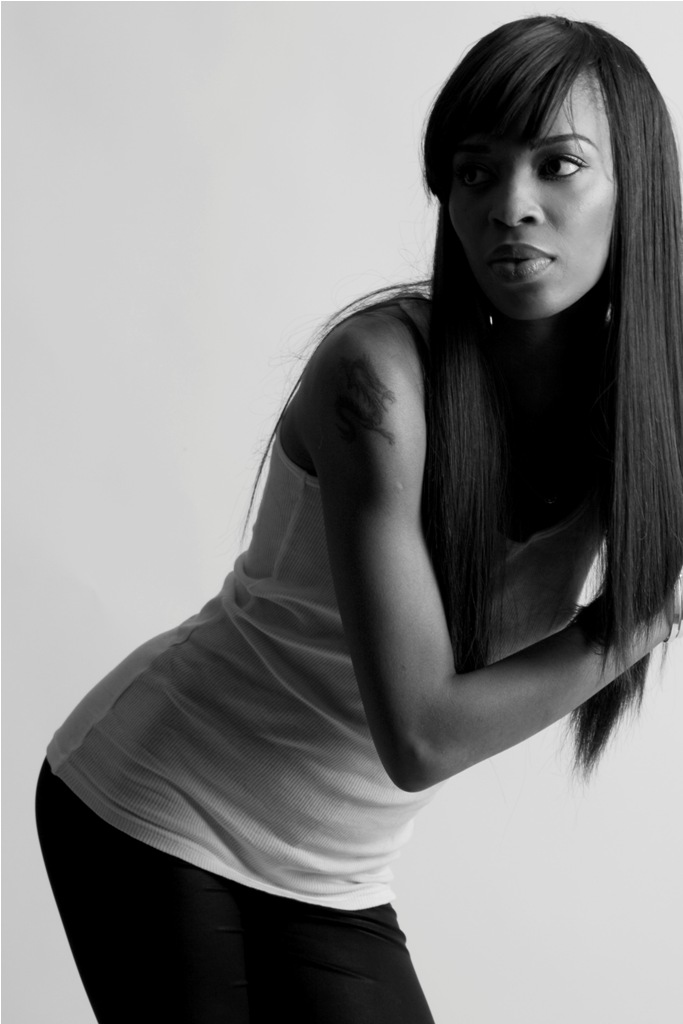Female model photo shoot of Toni Giselle Hair by Paul Tirado Photography, makeup by Flawless Sha