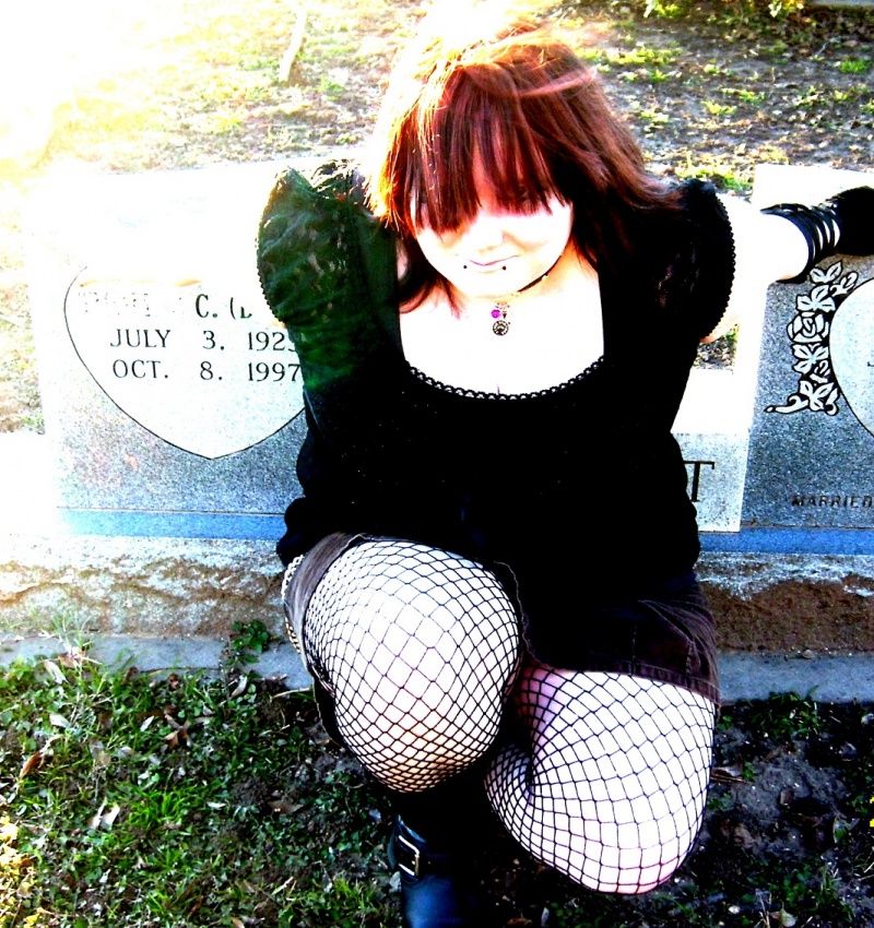 Female model photo shoot of Azra-Renny in Farmers Branch City Hall/ Cemetery