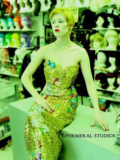 Female model photo shoot of ephemeral in costume shop . san rafael