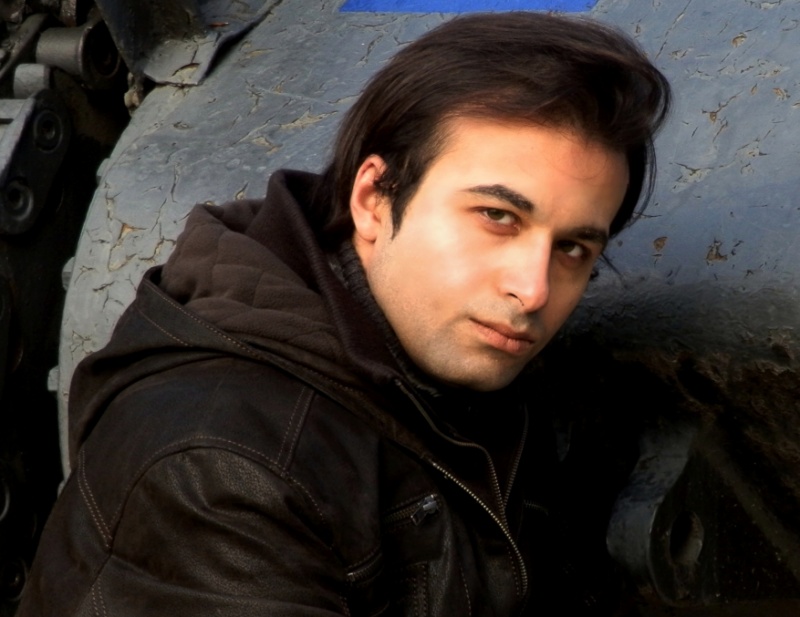Male model photo shoot of Umair Riaz in Yorkville Gardens