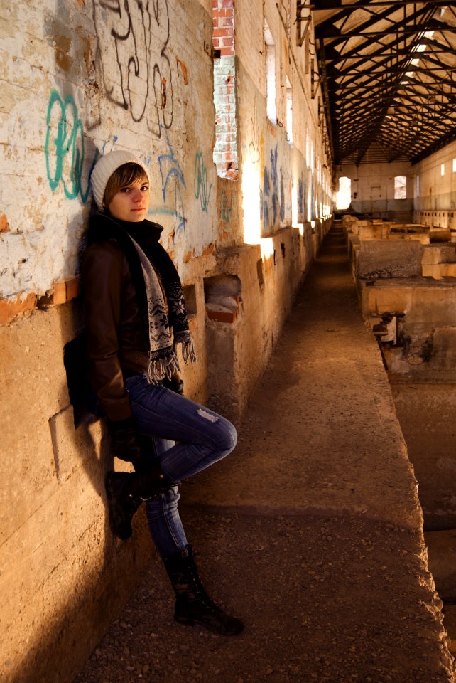Female model photo shoot of Abigail Kohler in abandoned pulp mill