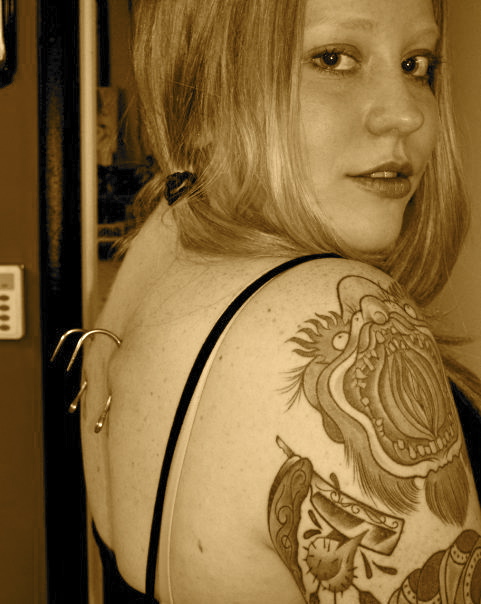 Female model photo shoot of SarahEllen Twirls in Bite the Bone Tattoo MD (no longer open)
