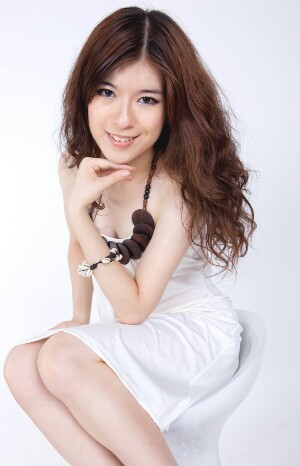 Female model photo shoot of Alice Tse in studio