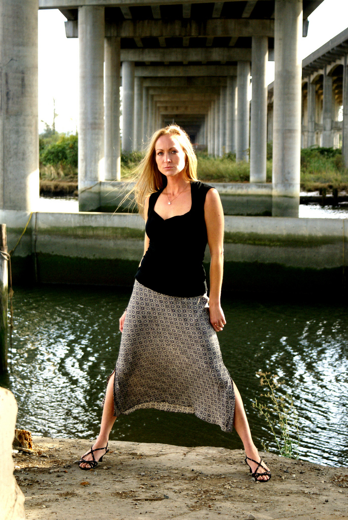 Female model photo shoot of Kryss K in Under the overpass