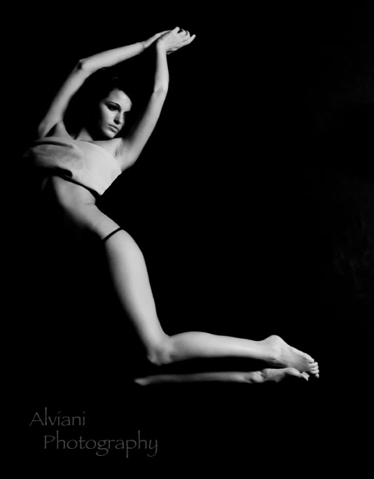 Female model photo shoot of Alviani Photography